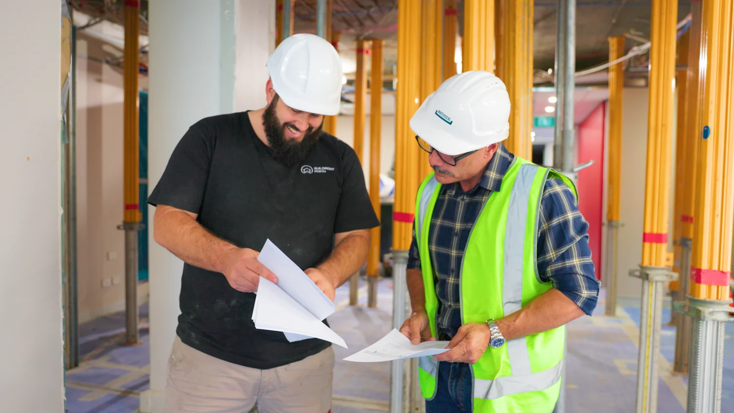 Waterseal team reviewing project plans at Adelaide Terrace